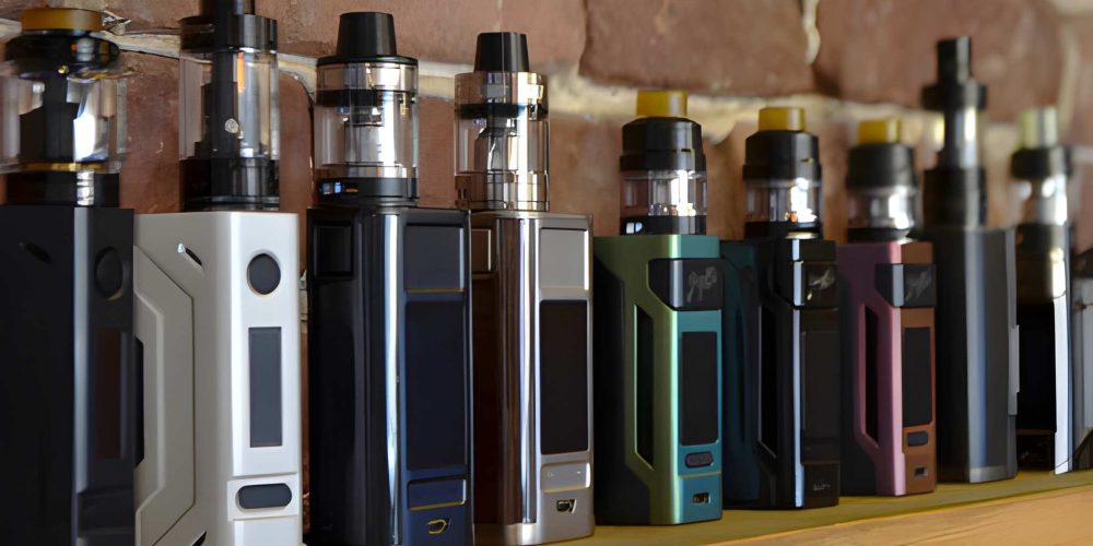 Assorted vape devices on shelf—Smoke Shop Stuart FL product lineup